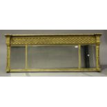 A Regency giltwood and gesso three-section overmantel mirror, the lattice moulded frieze above