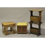 A pair of late 20th century oak occasional tables with magazine rack bases, width 51cm, a small