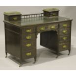 An Edwardian oak twin pedestal desk, the gallery back above a gilt-tooled green leather writing