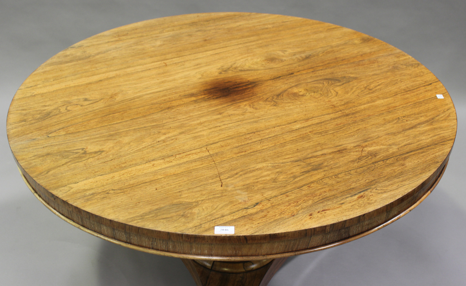 A Regency rosewood circular tip-top breakfast table, raised on a flared column and triform base with - Image 2 of 2