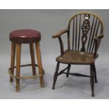 A late 19th century beech and elm Windsor wheel back armchair, height 85cm, width 51cm, together