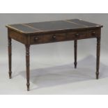 A late George III mahogany writing table with ebony banded borders, the top inset with three black