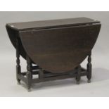 An 18th century oak oval gateleg table, on turned and block legs united by stretchers, height