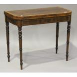 A George III mahogany and satinwood crossbanded fold-over card table, on turned tapering legs,