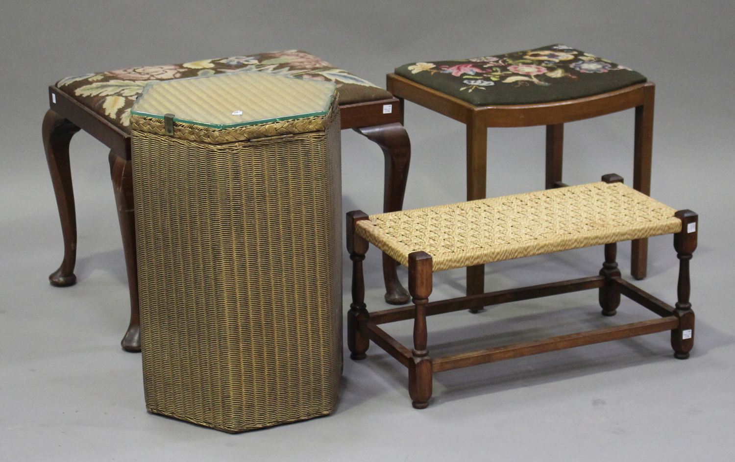 An early 20th century Lloyd Loom gilt painted laundry basket, height 56cm, width 34cm, together with
