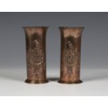 A pair of Keswick School of Industrial Arts hammered copper cylindrical vases, each worked with