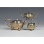 A late Victorian Aesthetic period plated three-piece bachelor's tea set, comprising teapot, sugar