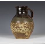 A large Bryan Newman Aller studio pottery stoneware jug, the pear shaped body with tenmoku type