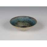 A Derek Davis studio pottery stoneware bowl of flared circular shape with a glassy and crystalline