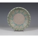 A Pilkington's Royal Lancastrian pottery circular bowl, 1920-38, the matt grey glazed body decorated