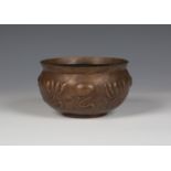 A Keswick Home Industries hammered copper bowl by William Henry Mawson, the sides worked with