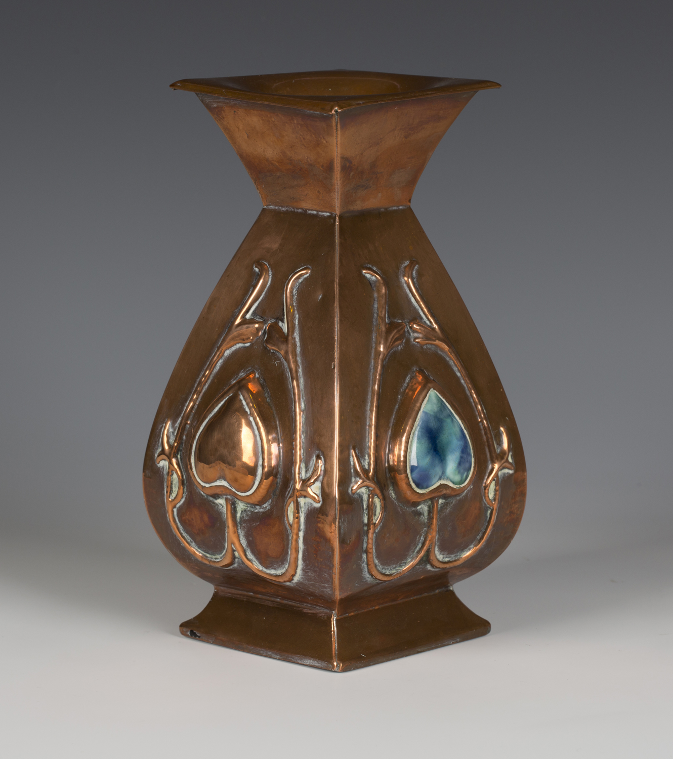 An Arts and Crafts copper vase of square section baluster form, the body worked with stylized - Image 3 of 3
