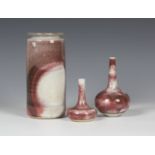 A Derek Davis studio pottery tall cylindrical vase with short everted neck rim, covered in a