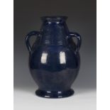 A large cobalt blue glazed art pottery tyg, late 19th century, of the type made by Brannam for