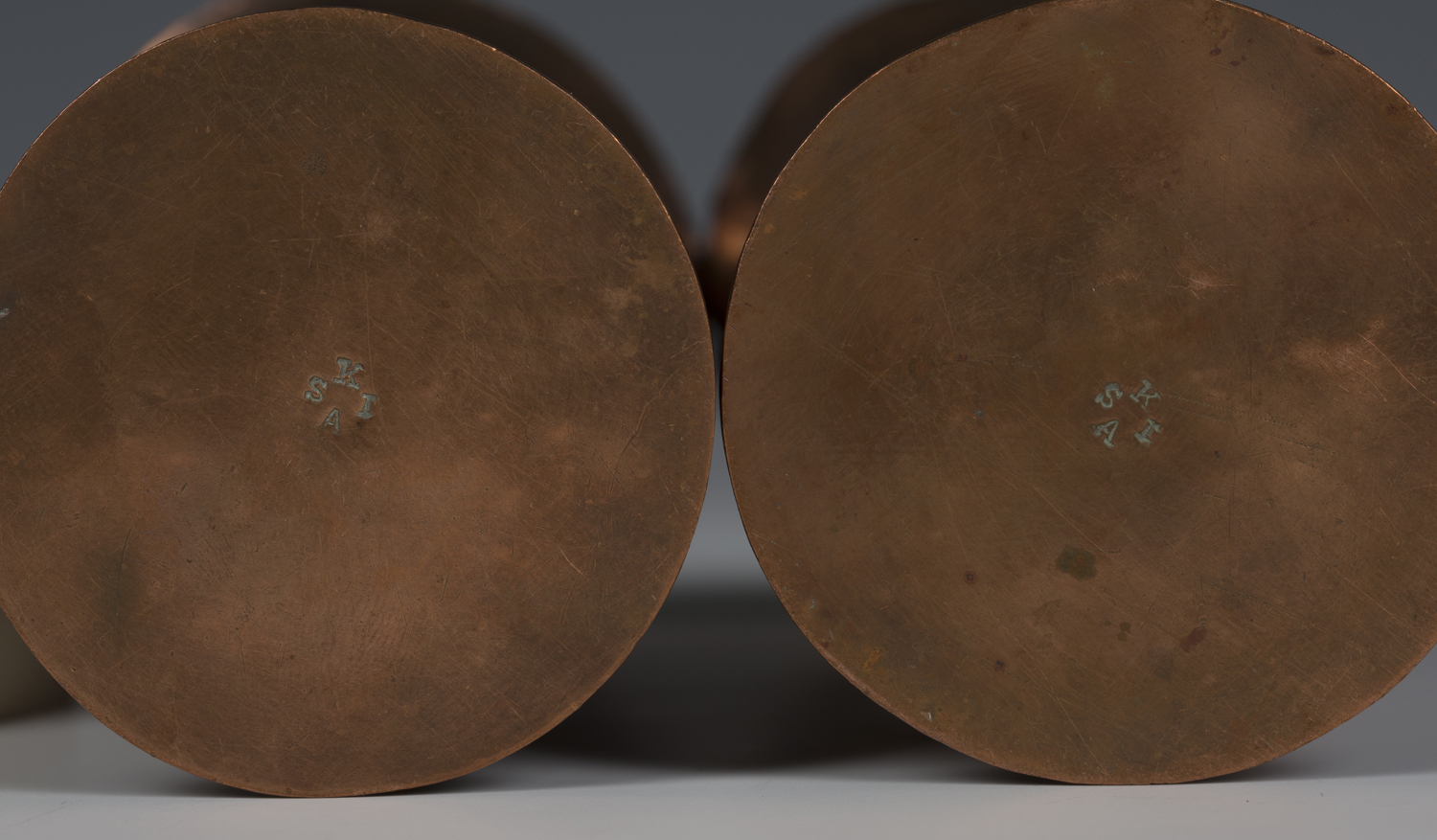 A pair of Keswick School of Industrial Arts hammered copper cylindrical vases, each worked with - Image 2 of 2