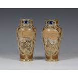 A pair of Royal Doulton stoneware vases, early 20th century, the high shouldered tapered bodies