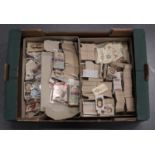 A quantity of various cigarette and trade cards in eight cartons.Buyer’s Premium 29.4% (including