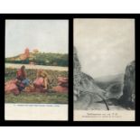 A collection of 32 postcards, all foreign topographical views, including printed postcards titled '