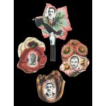 A group of 4 rare W.N. Sharpe of Bradford 'Floral Football' and 'New Buttonhole Football' shaped