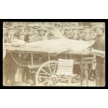 A photographic postcard of a crowd surrounding a shark, identified as Sandgate Kent, captioned '