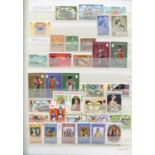 A collection of six stock books containing world stamps, including Great Britain, British