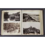PHOTOGRAPHS. An album containing approximately 93 mounted and captioned albumen-print photographs of