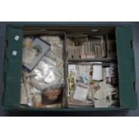 A quantity of various cigarette and trade cards in eight cartons.Buyer’s Premium 29.4% (including