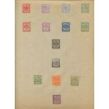 A folder of stamp forgeries and reprints, including British Commonwealth, Transvaal, Hawaii and