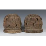 A pair of Chinese carved wood lotus beam ends/finials, Ming dynasty, each carved with overlapping