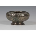 A Chinese silver bowl, early 20th century, the compressed circular body worked in relief with bamboo