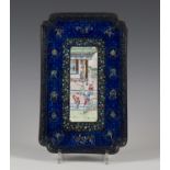 A Chinese Canton enamel tray, 19th century, of rectangular shape with indented corners, painted with