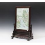 A Chinese stained wood and porcelain table screen and slotted stand, 20th century, the rectangular