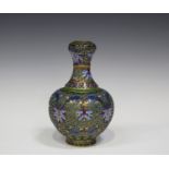 A Chinese cloisonné bottle vase, 20th century, the globular body with narrow neck and onion mouth,