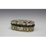 A Chinese Canton porcelain oval box and hinged cover, late 19th century, with gilt metal mounts, the