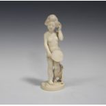 A Japanese carved ivory okimono figure of a nude maiden, Meiji/Taisho period, modelled standing,