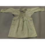 A late Victorian heavy linen boy's Sussex smock with gathered front and sleeves, length 77cm (some