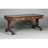 A William IV rosewood library table, in the manner of Gillows, the top inset with gilt-tooled red