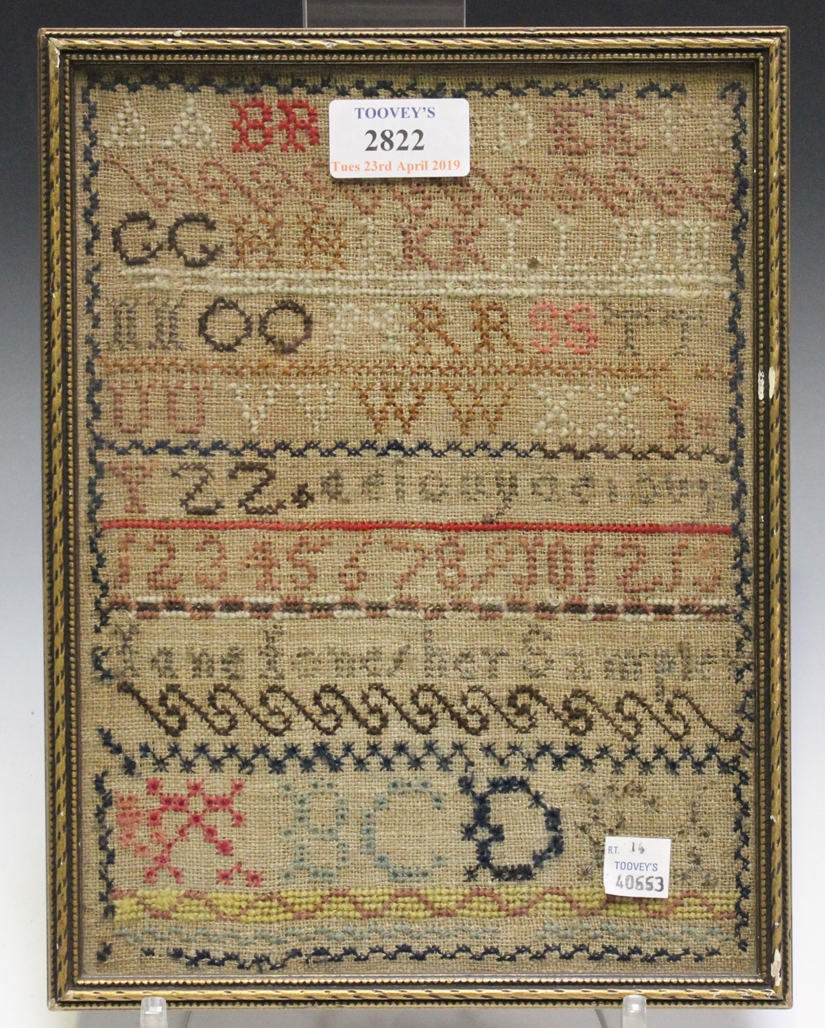 A Victorian needlework sampler by Susan Dade Canady, Aged 11 Years, 41cm x 42cm (faults), together