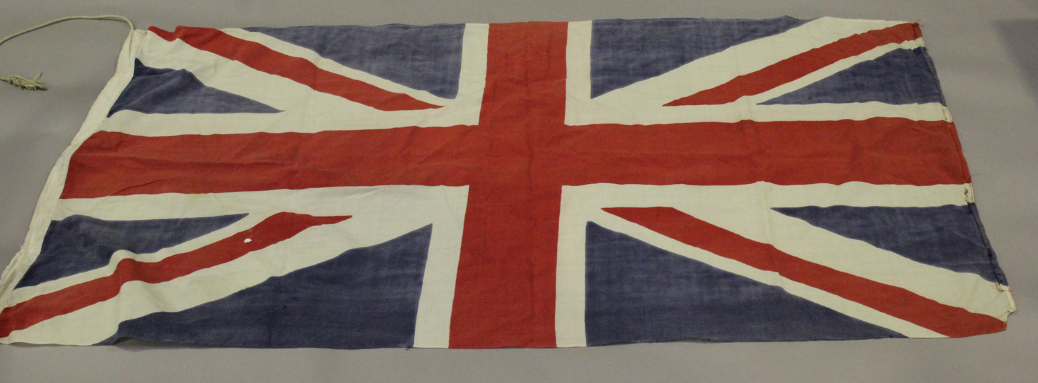 A group of six post-war flags, mostly stitched, including a large Swedish flag, 345cm x 183cm, a