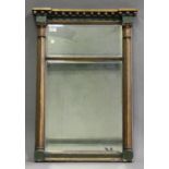 A Regency and later green and gilt painted pier mirror with a ballshot frieze and reeded