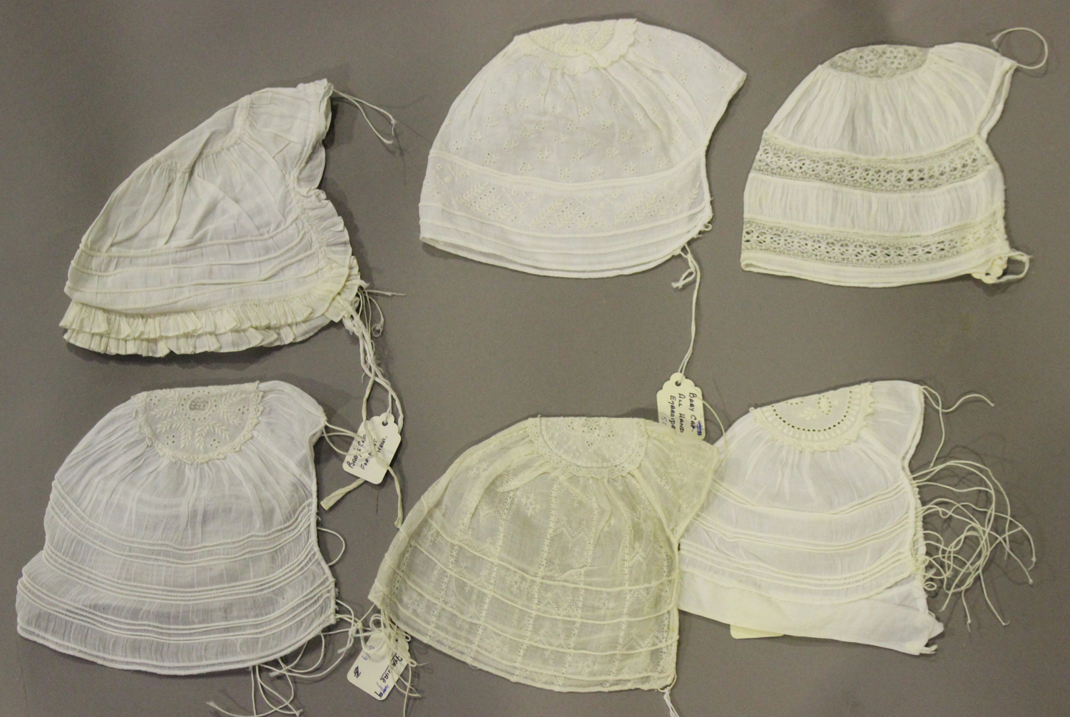 A group of fifteen mainly Victorian babies' caps, the majority with decorative lacework, including