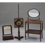 A 20th century George III style mahogany swing frame toilet mirror, fitted with drawers to base,