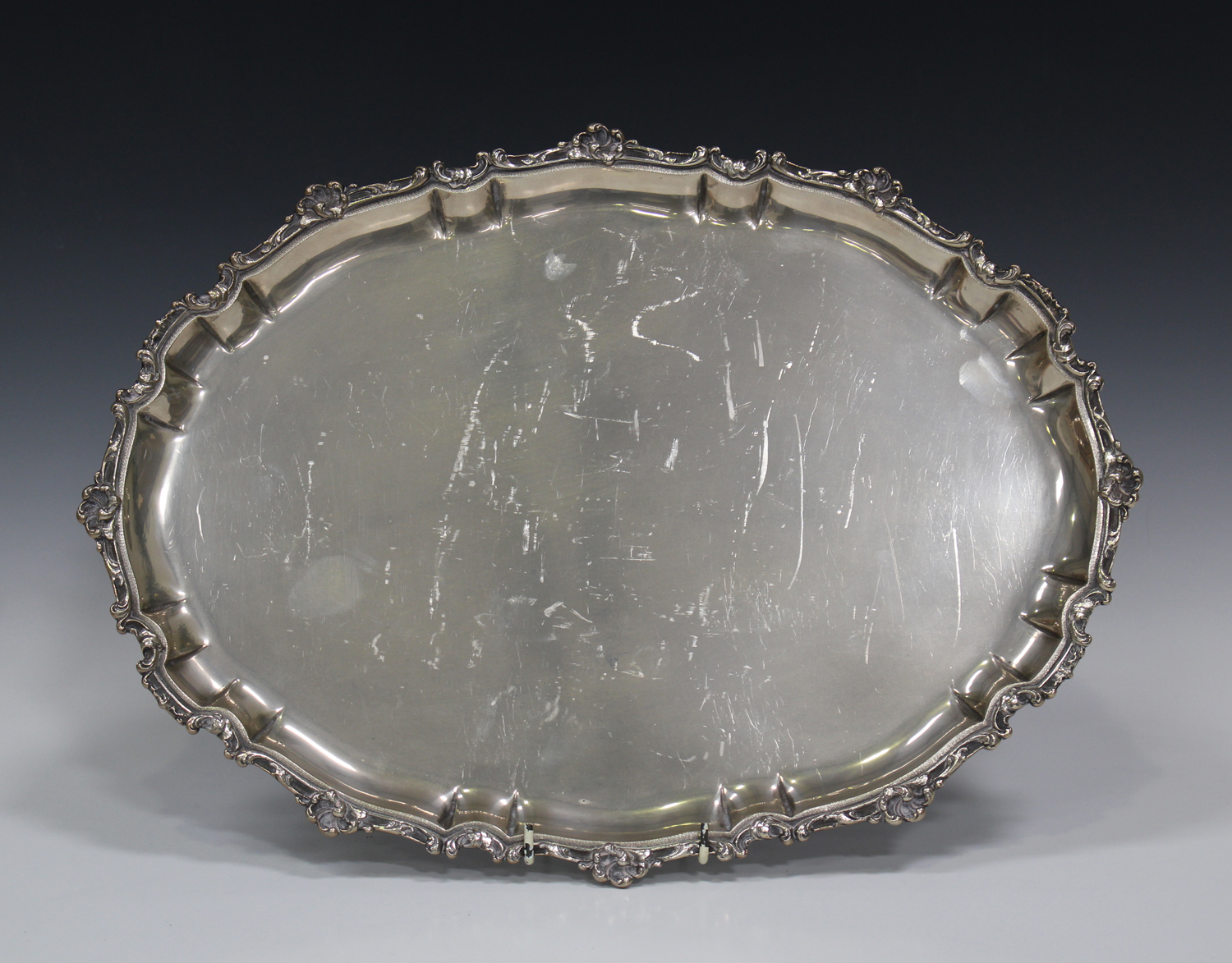 A 20th century Continental .800 silver oval tray with cast foliate rim, length 44.5cm.Buyer’s
