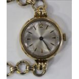 A 9ct gold circular cased lady's wristwatch, detailed within the case back 'R.W.Co Ltd 160857',