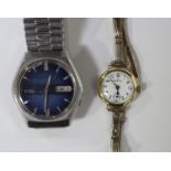 A Zenith 9ct gold circular cased lady's wristwatch with a signed gilt jewelled movement, the