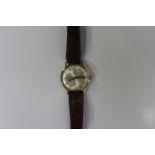 An Omega De Ville Automatic 9ct gold cased gentleman's wristwatch, the signed silvered dial with