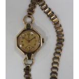 A Tudor 9ct gold octagonal cased lady's wristwatch with signed jewelled movement, the case back