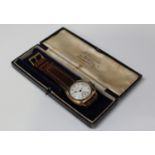 A Waltham USA 18ct gold cushion cased gentleman's wristwatch, the jewelled lever movement