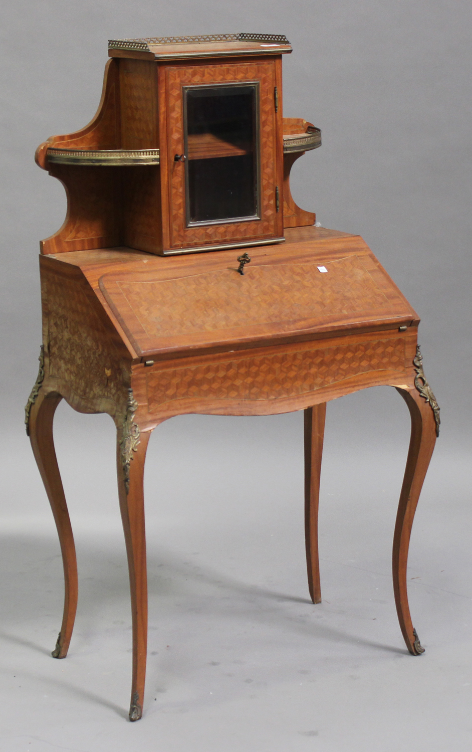 A 20th century French kingwood parquetry bonheur-du-jour, the glazed cabinet top above a fall flap