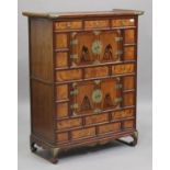 A 20th century South-east Asian softwood and brass mounted side cabinet, fitted with three drawers